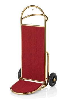 Gepäckkarre mit Klappschaufel, rotem Teppich u. goldenfarbenes Gestell.